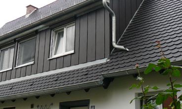 Verkleidungen und Dachumdeckung